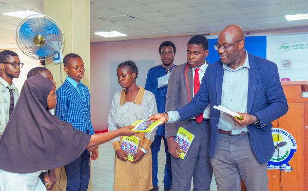 Prof chukwumerije Handing the Climate Edu